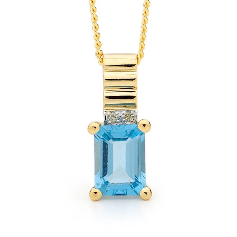 Blue Topaz and Diamond Pendant