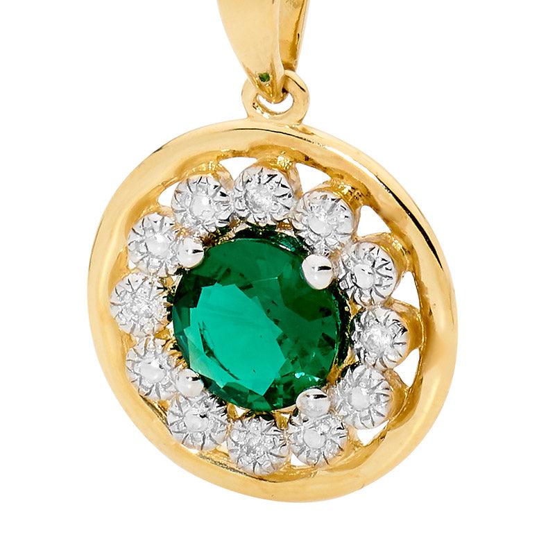 Emerald pendant with Diamond Halo